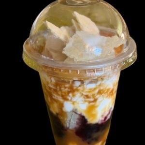 Cuchareable de oblea artesanal Juisanni con arequipe y crema.